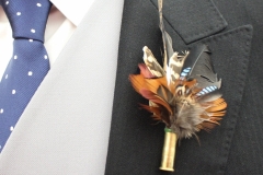Game bird feather buttonhole